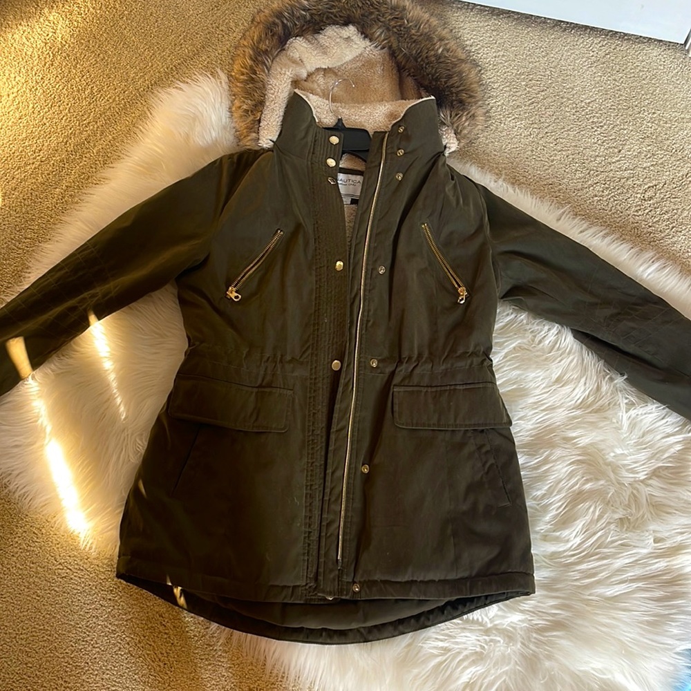 Women Small Winter Jacket, with furry hood. Suits well and is comfortable.